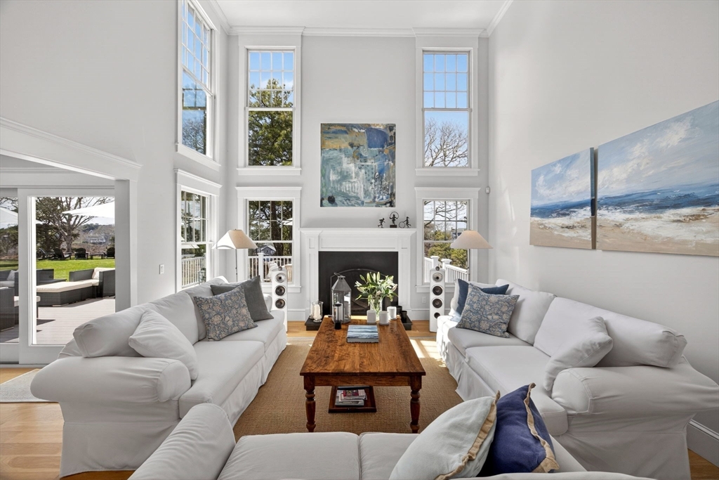 70 Judges Way Chatham, MA 02633 - Photo 4 of 41 a living room with furniture fireplace and a large window