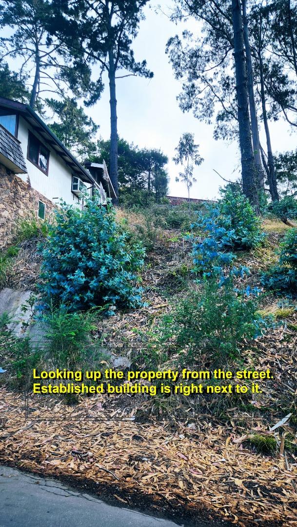 1 Wave Moss Beach Moss Beach, CA 94038 - Photo 2 of 3 a street sign on a wooden wall