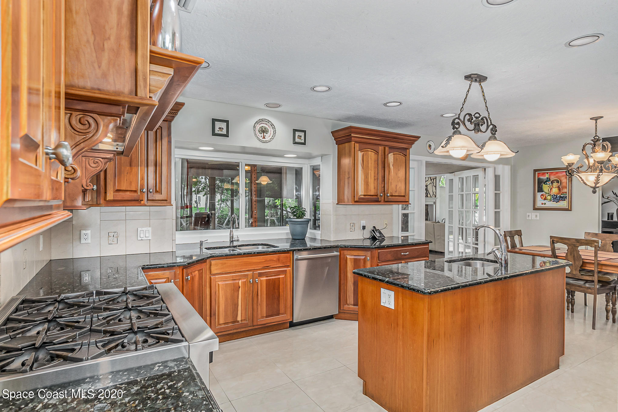 457 Turtle Circle Satellite Beach, FL 32937 - Photo 13 of 70 Granite Countertops; Island w/ Sink