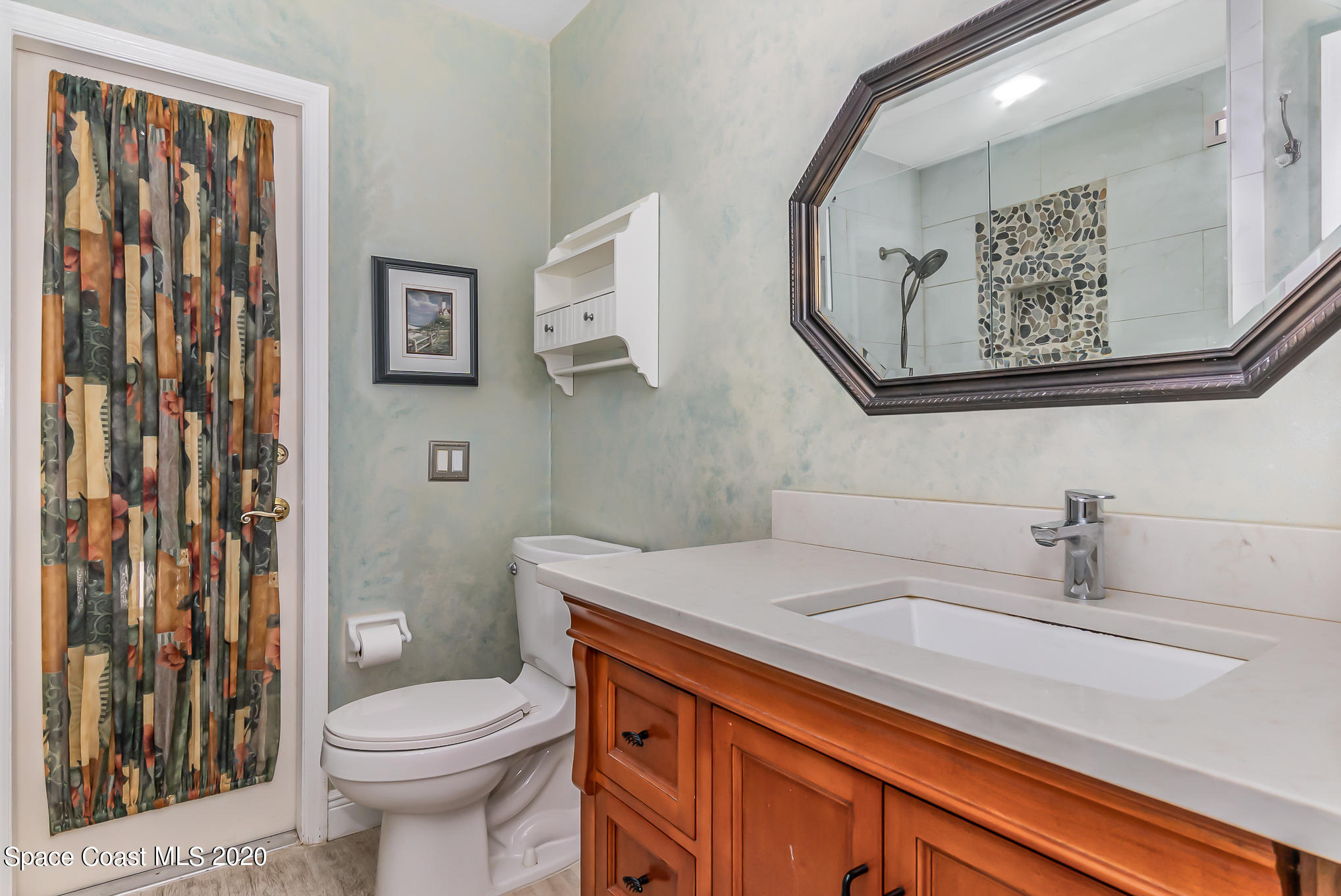 457 Turtle Circle Satellite Beach, FL 32937 - Photo 25 of 70 Downstairs Bathrm w/ Access to Sun Rm