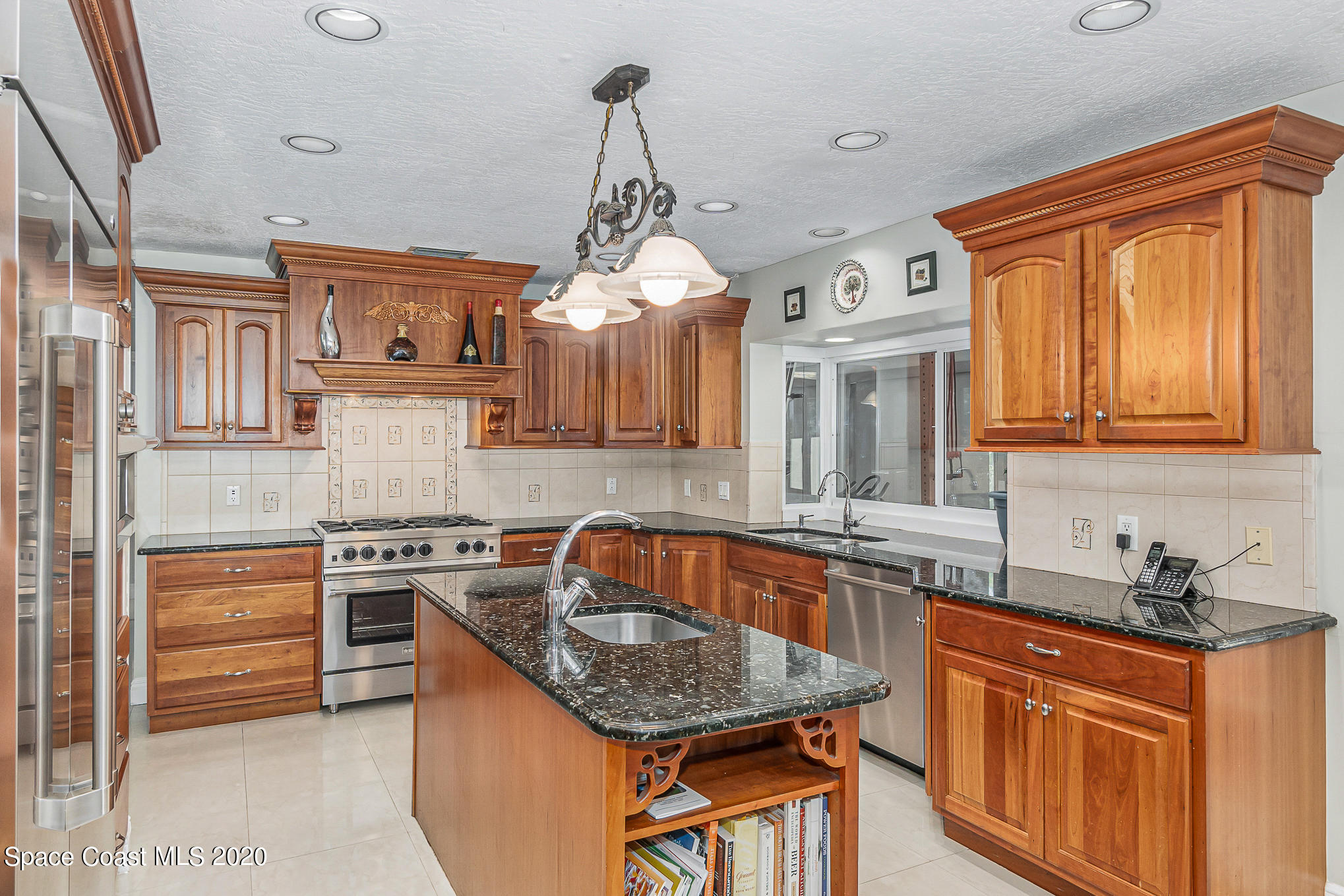 457 Turtle Circle Satellite Beach, FL 32937 - Photo 9 of 70 Cherrywood Cabinetry