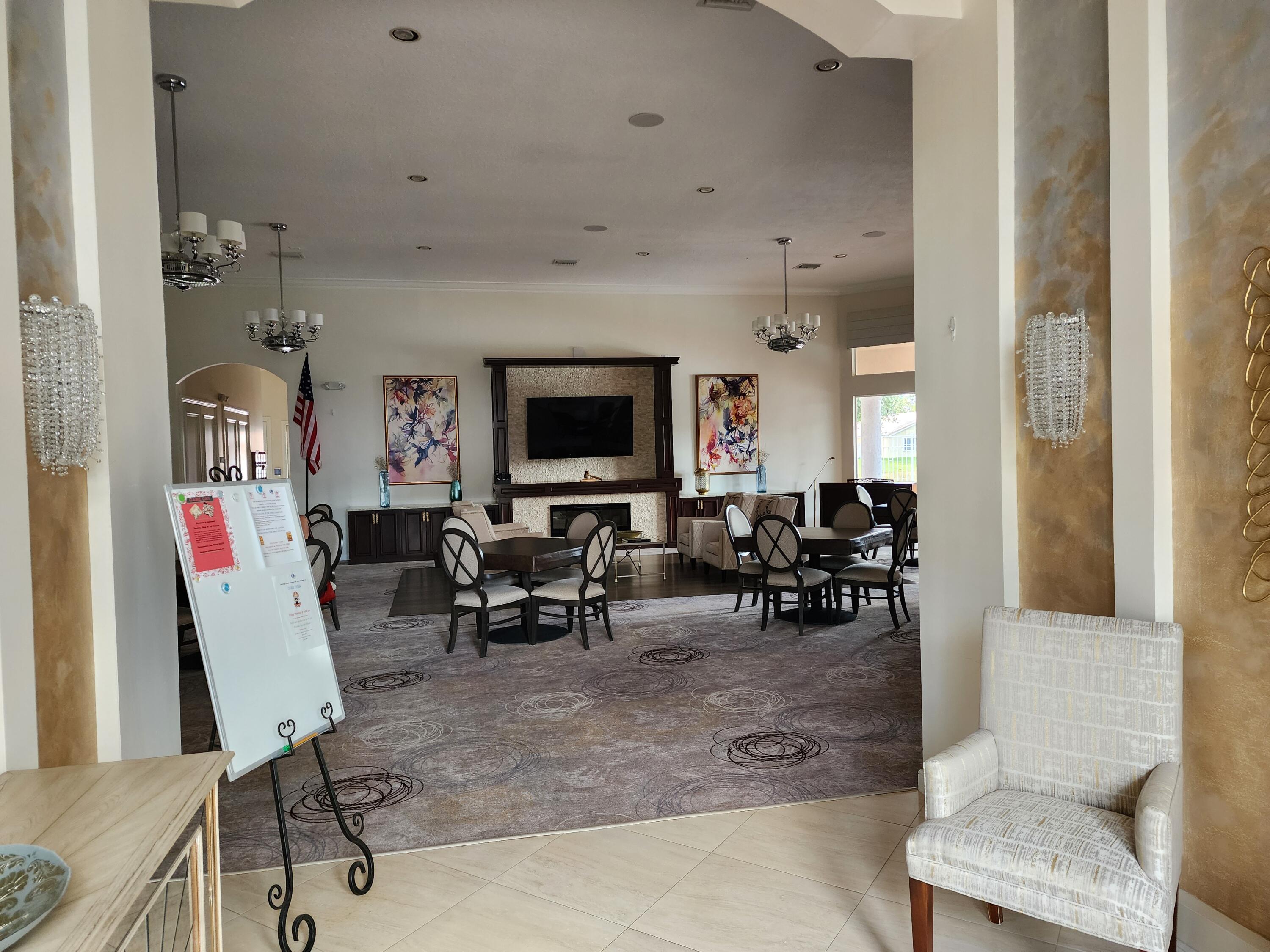7316 Modena Drive Boynton Beach, FL 33437 - Photo 14 of 24 a view of living room filled with furniture and rug