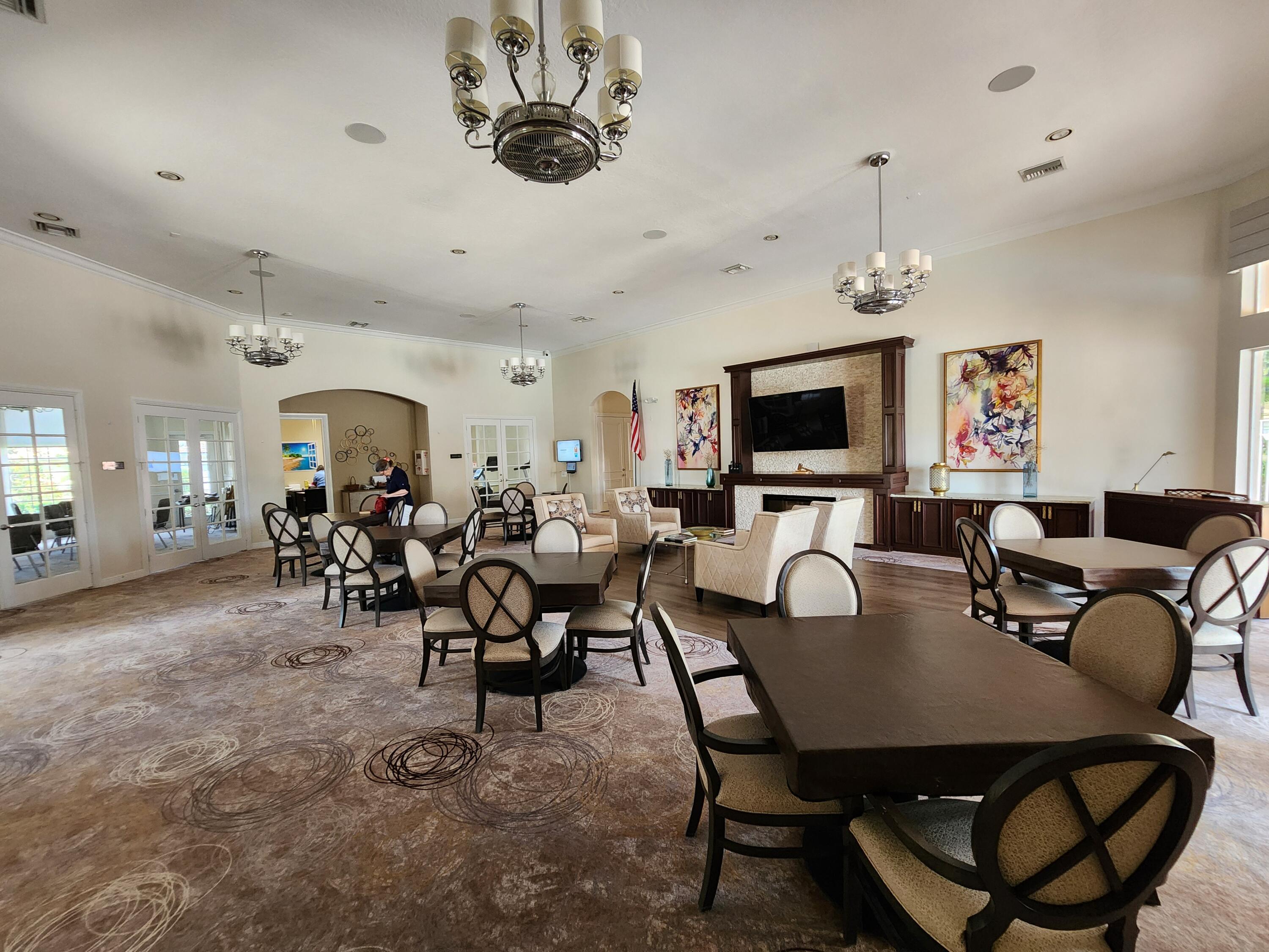7316 Modena Drive Boynton Beach, FL 33437 - Photo 15 of 24 a view of a dining room with furniture