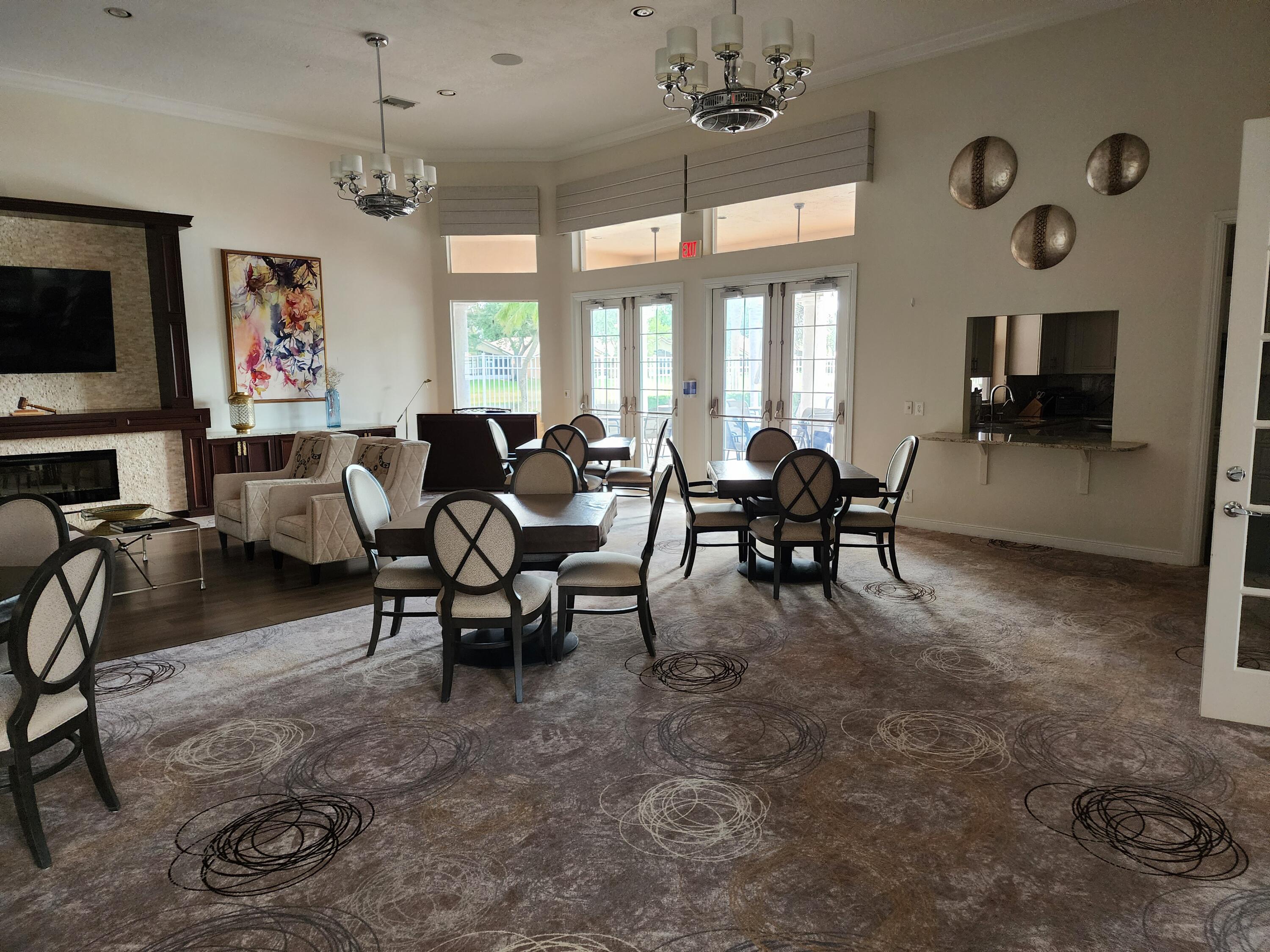 7316 Modena Drive Boynton Beach, FL 33437 - Photo 16 of 24 a living room with furniture and a flat screen tv