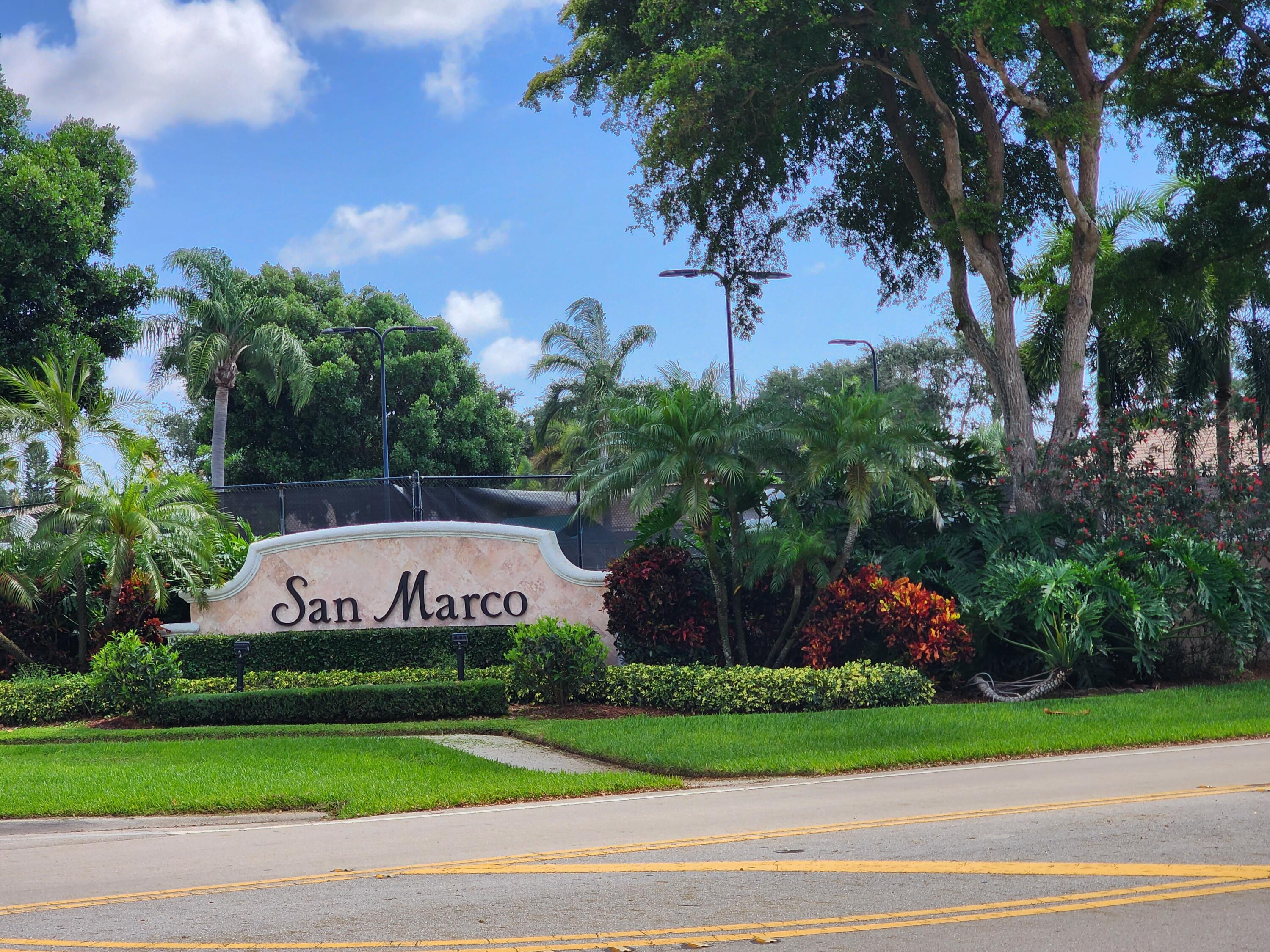 7316 Modena Drive Boynton Beach, FL 33437 - Photo 23 of 24 a sign that is sitting on the side of a road