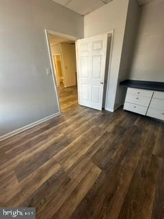 21614 Great Mills Road, Unit 104 Lexington Park, MD 20653 - Photo 7 of 17 a view of empty room with wooden floor