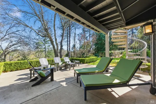a view of a chairs and couches in the patio