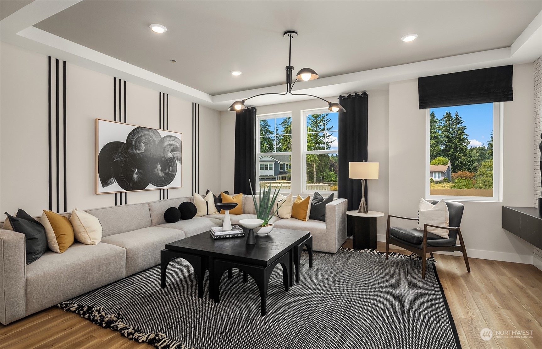 20348 91st Avenue Northeast, Unit C Bothell, WA 98021 - Photo 6 of 16 a living room with furniture and a large window