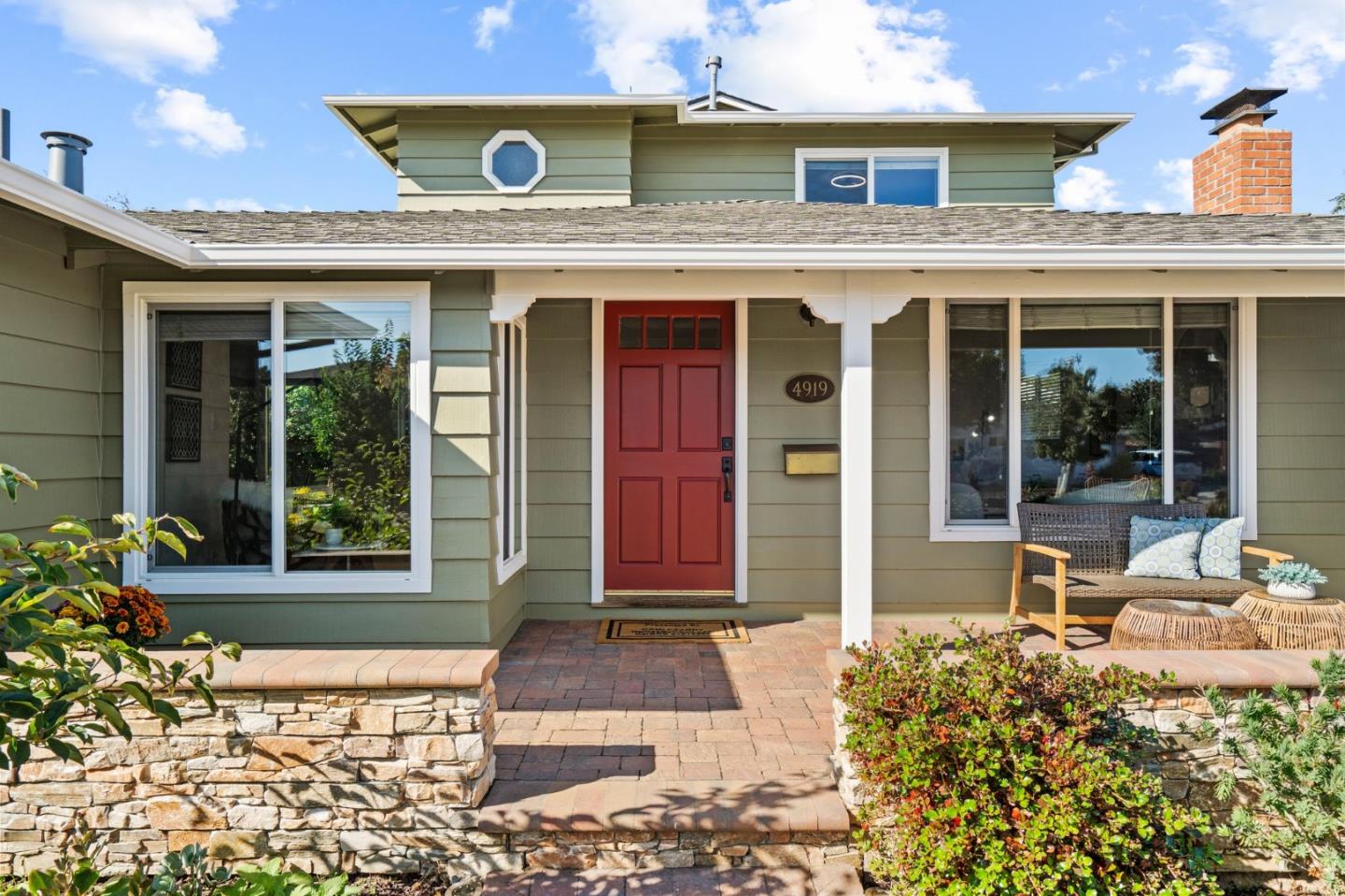 4919 Kenson Drive San Jose, CA 95124 - Photo 2 of 2 front view of a brick house with a large window