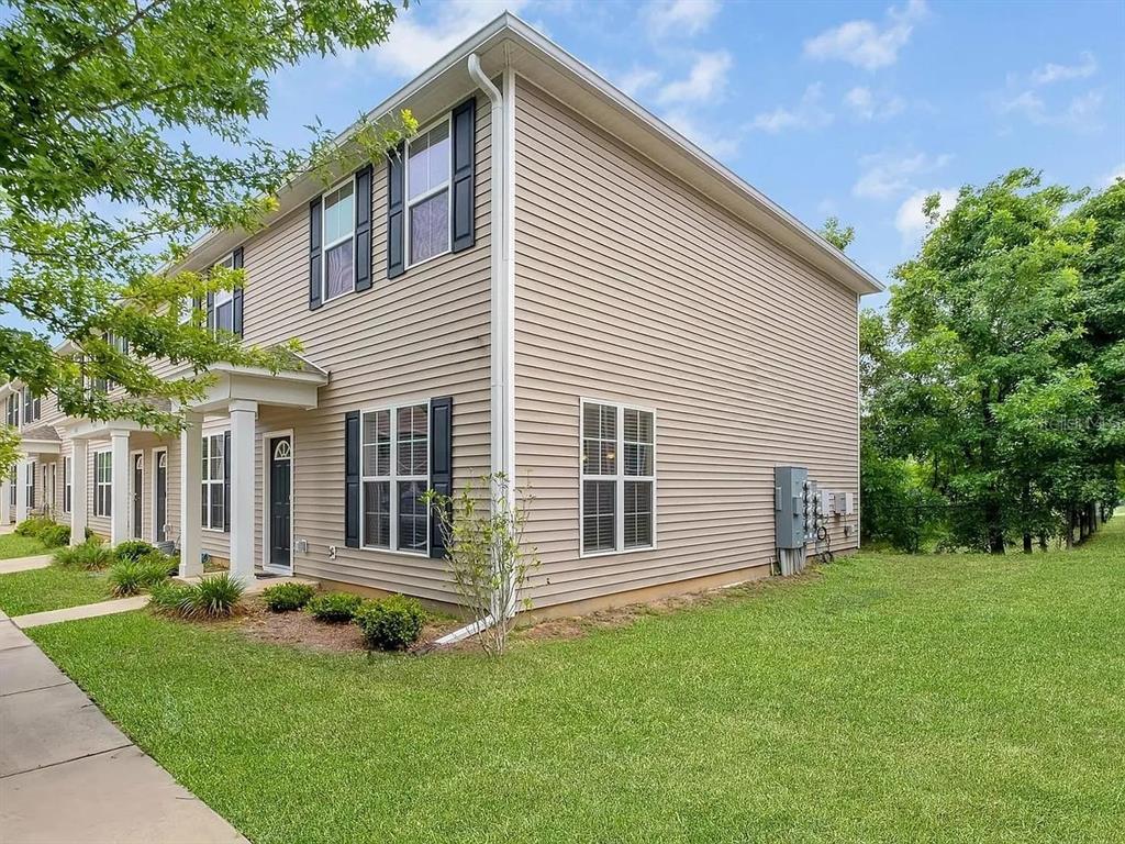 3660 Tyson Road, Unit 707 Tallahassee, FL 32310 - Photo 3 of 14 a view of a house with a backyard