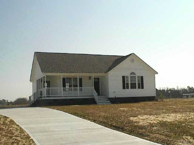 a house view with a outdoor space