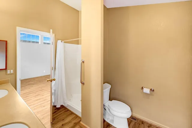 a bathroom with a sink and toilet