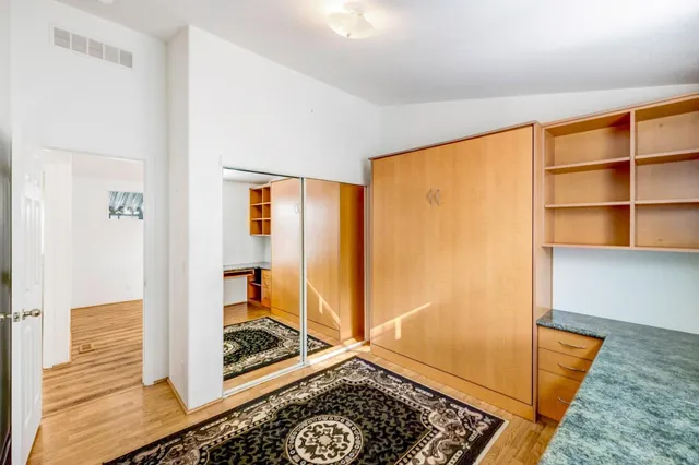 a view of an empty room and window