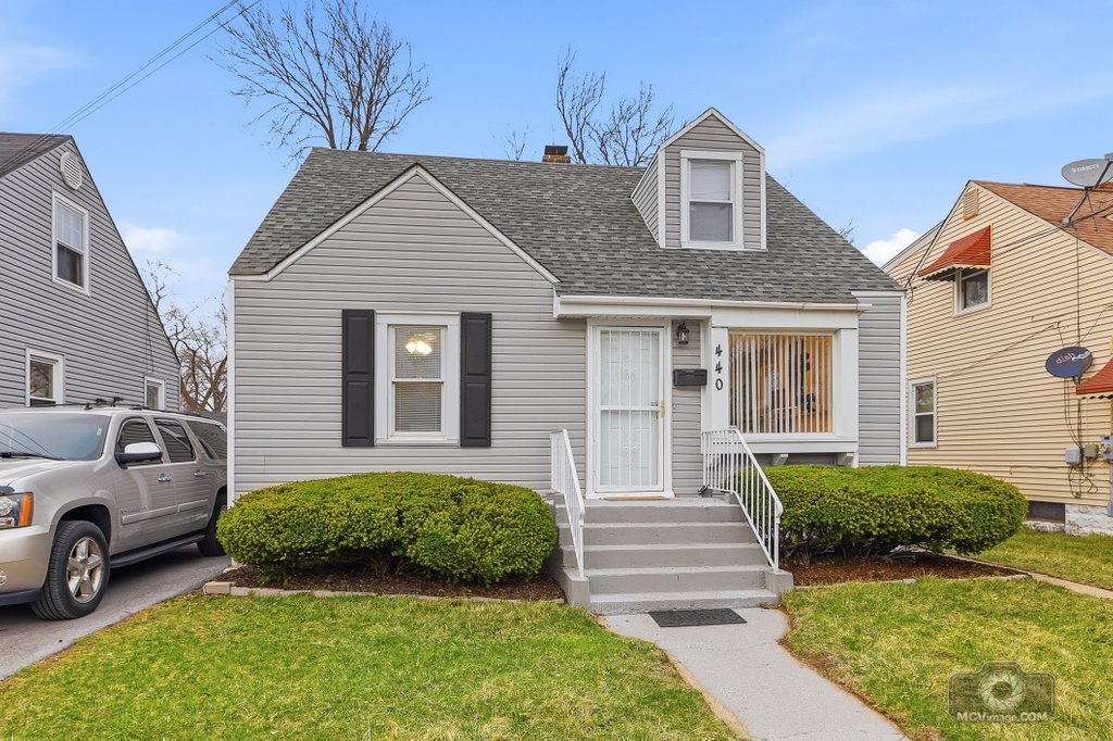 440 Engle Street Dolton, IL 60419 - Photo 1 of 19 a front view of a house with a yard