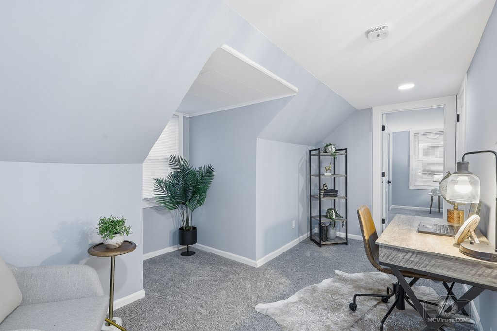 440 Engle Street Dolton, IL 60419 - Photo 11 of 19 a view of a workspace with furniture and a potted plant