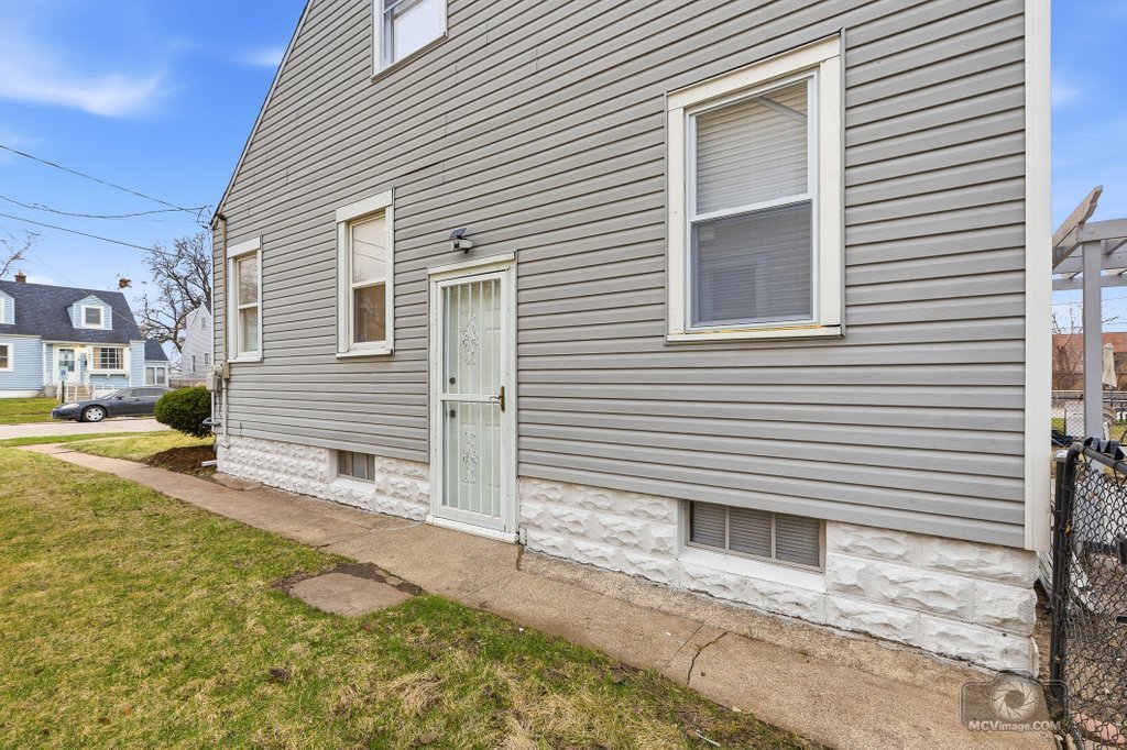 440 Engle Street Dolton, IL 60419 - Photo 19 of 19 a view of a house with a yard and sitting space