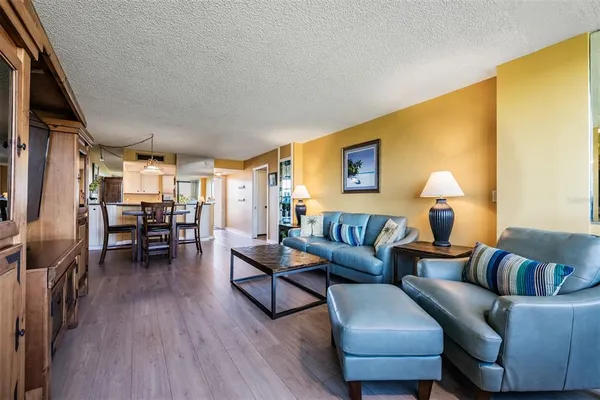 a view of a livingroom with furniture window and outside view