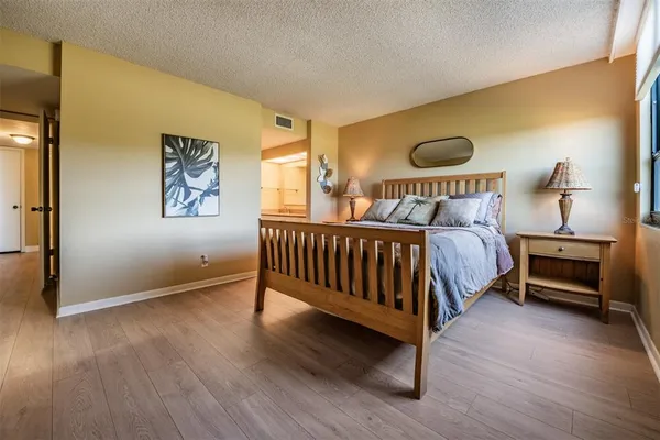 a bathroom with a double vanity sink and mirror