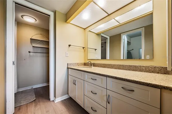 a view of a hallway with windows