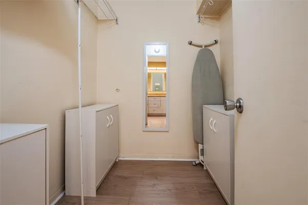 a bathroom with a glass shower door