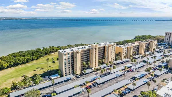 a view of a city with an ocean view