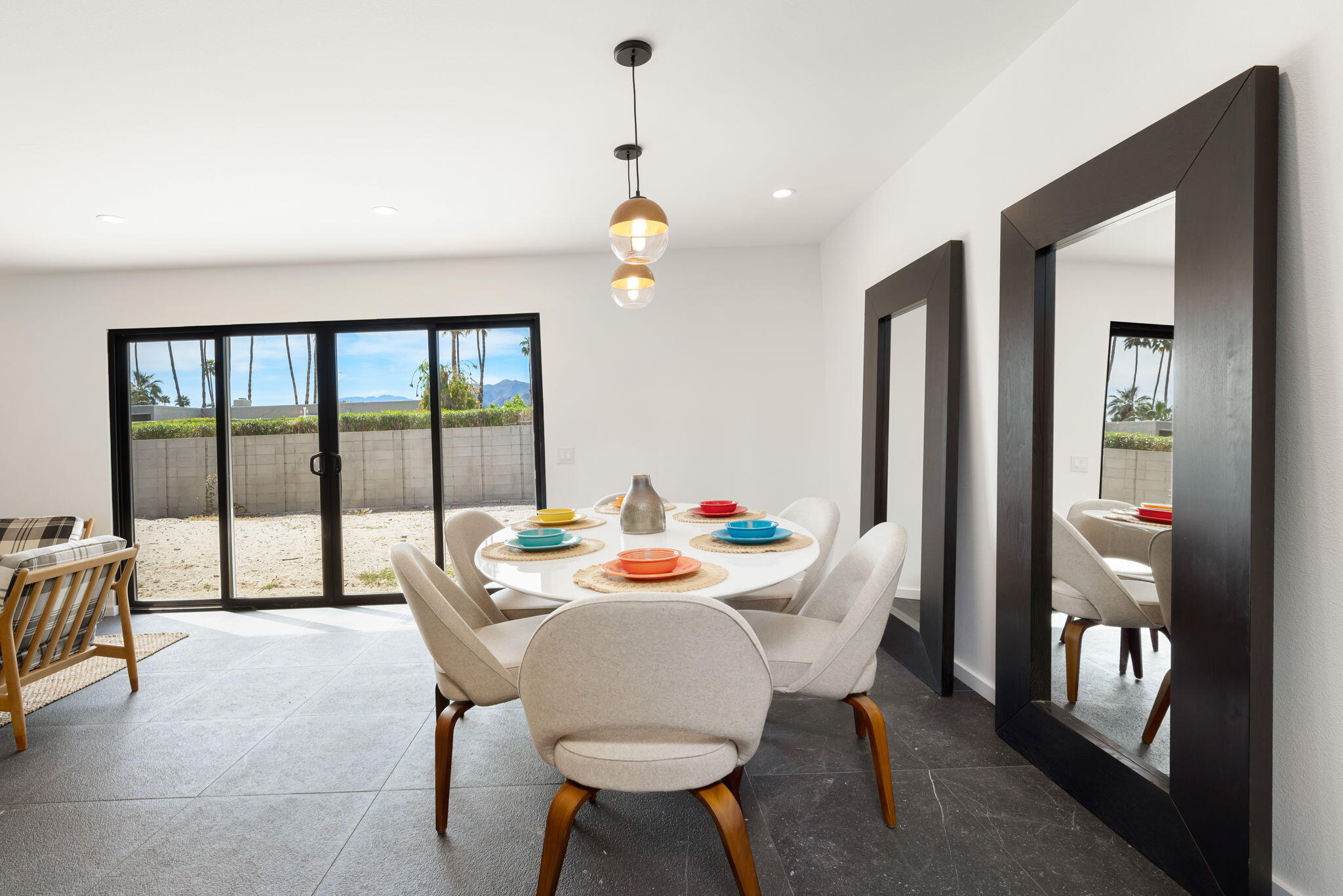 70131 Chappel Road Rancho Mirage, CA 92270 - Photo 12 of 42 a outdoor dining space with furniture and a chandelier