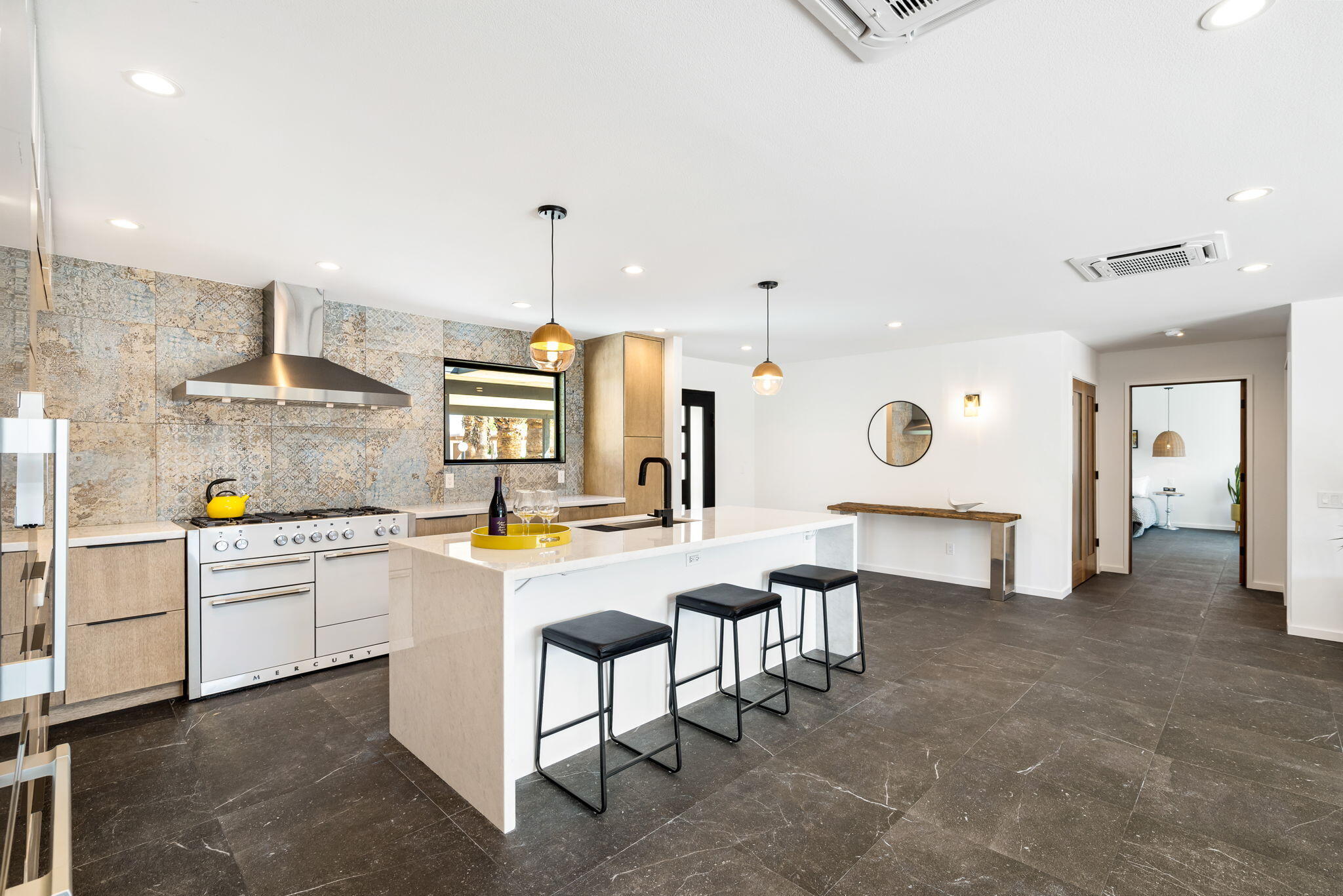 70131 Chappel Road Rancho Mirage, CA 92270 - Photo 19 of 42 a large kitchen with lots of counter space and appliances