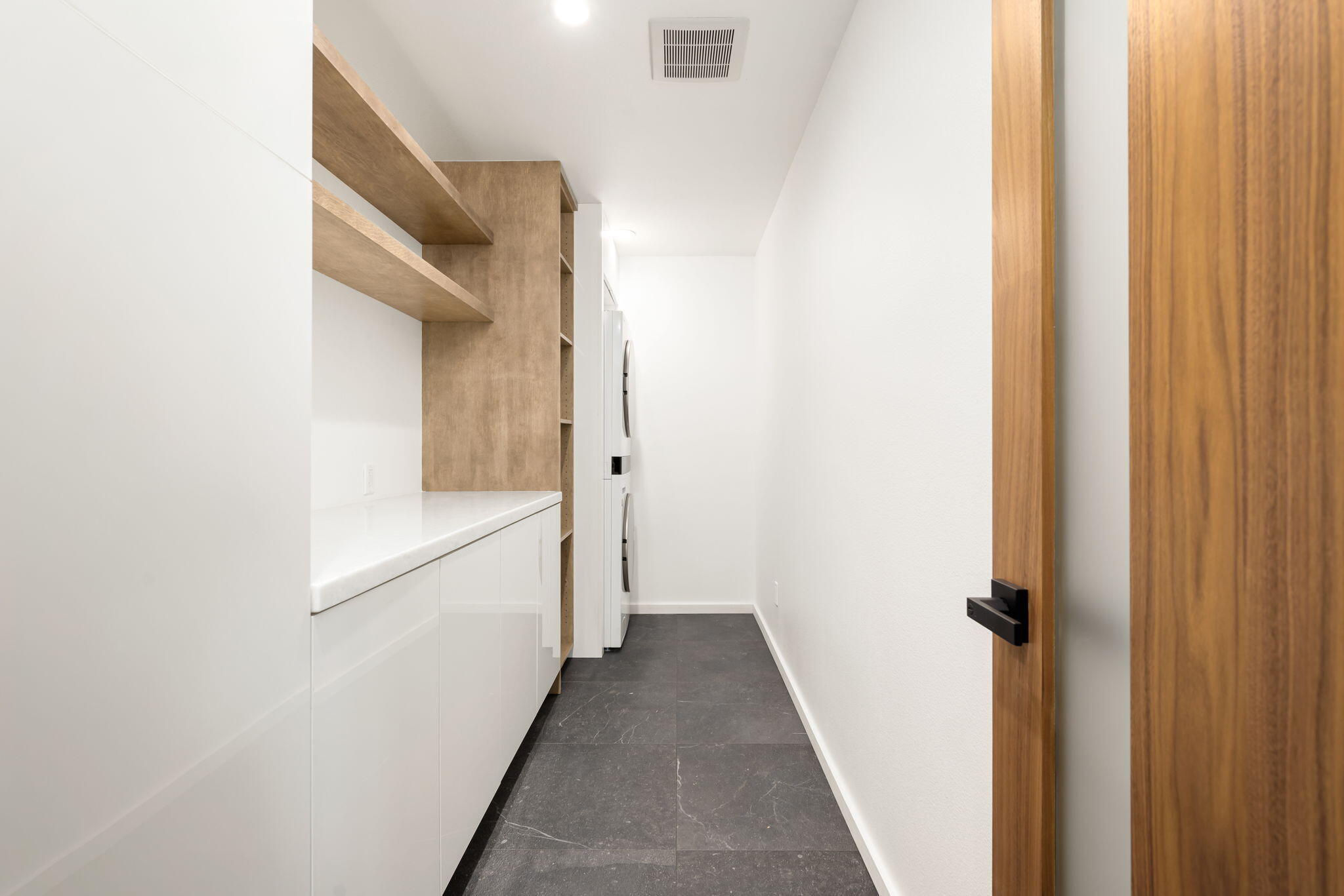 70131 Chappel Road Rancho Mirage, CA 92270 - Photo 28 of 42 a view of a hallway with wooden floor and entryway