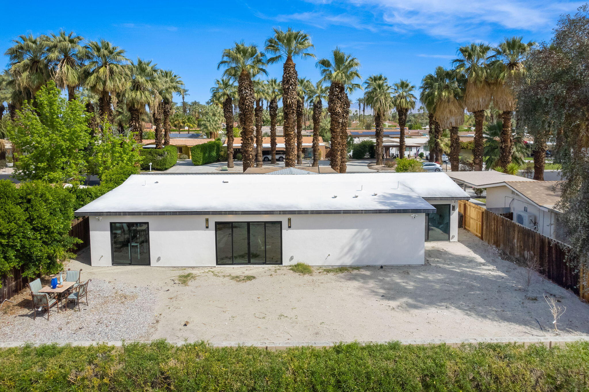 70131 Chappel Road Rancho Mirage, CA 92270 - Photo 29 of 42 a view of a house with a yard and tree s