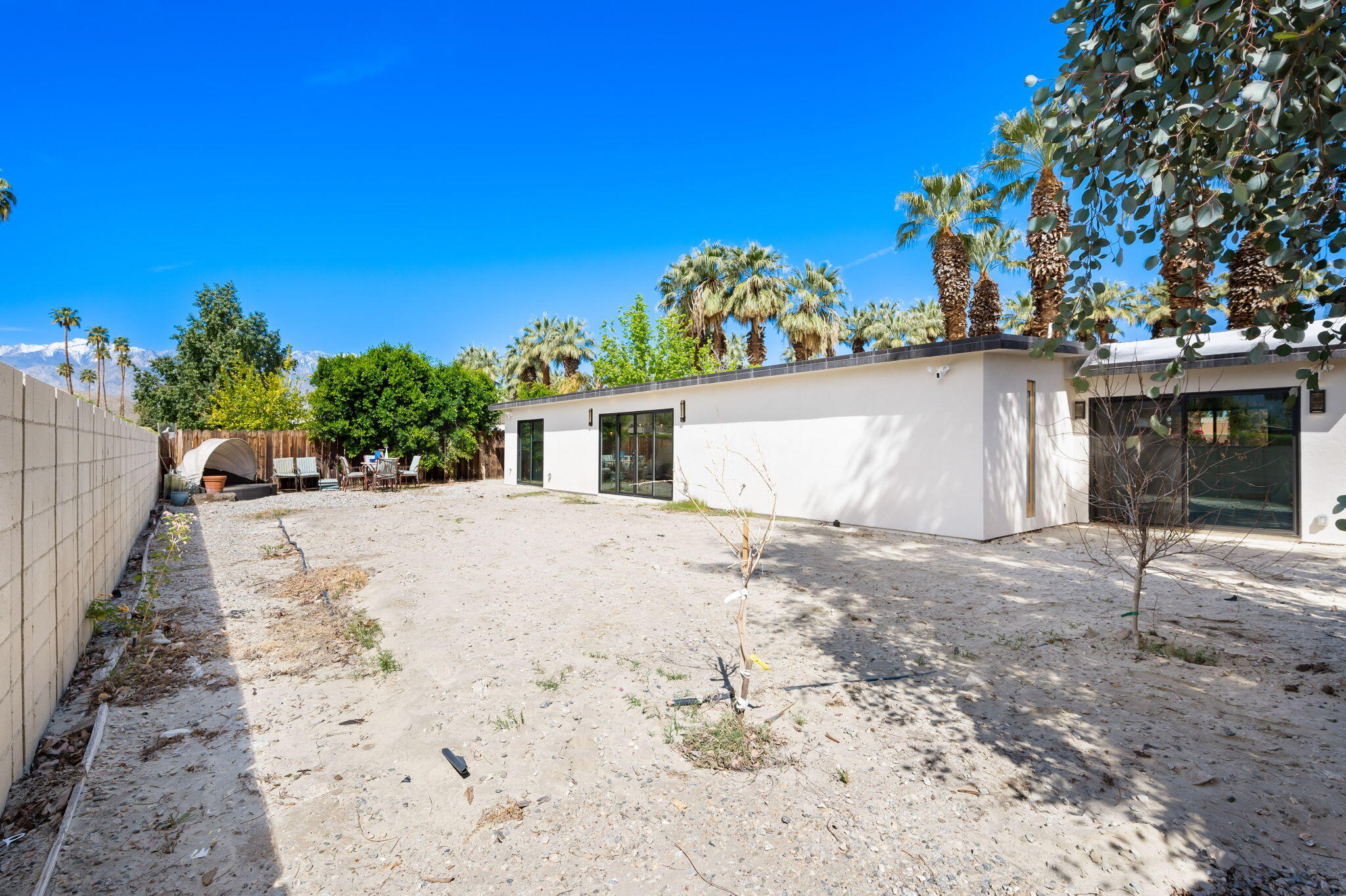 70131 Chappel Road Rancho Mirage, CA 92270 - Photo 31 of 42 a view of a house with a yard and garage