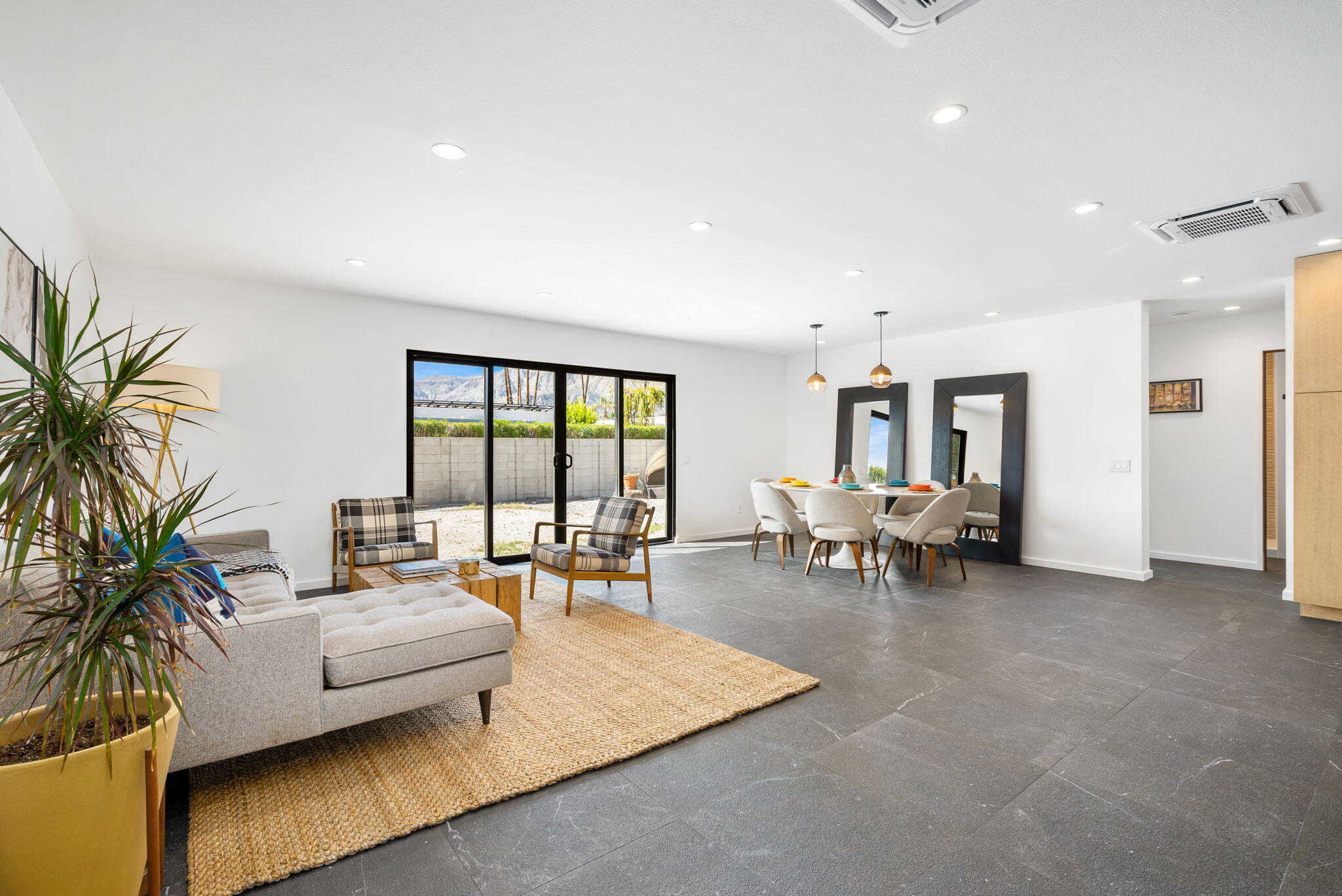 70131 Chappel Road Rancho Mirage, CA 92270 - Photo 10 of 42 a living room with furniture and a large window