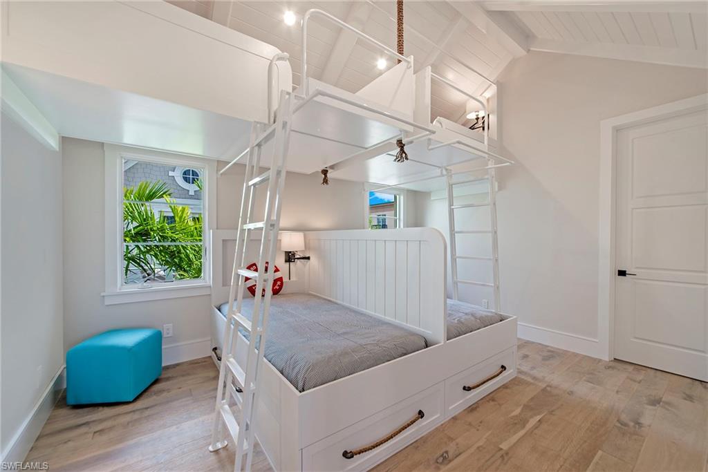 434 3rd Avenue South Naples, FL 34102 - Photo 12 of 24 a living room with furniture and a window
