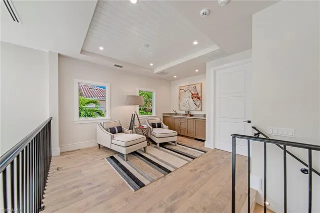 a living room with furniture and a table