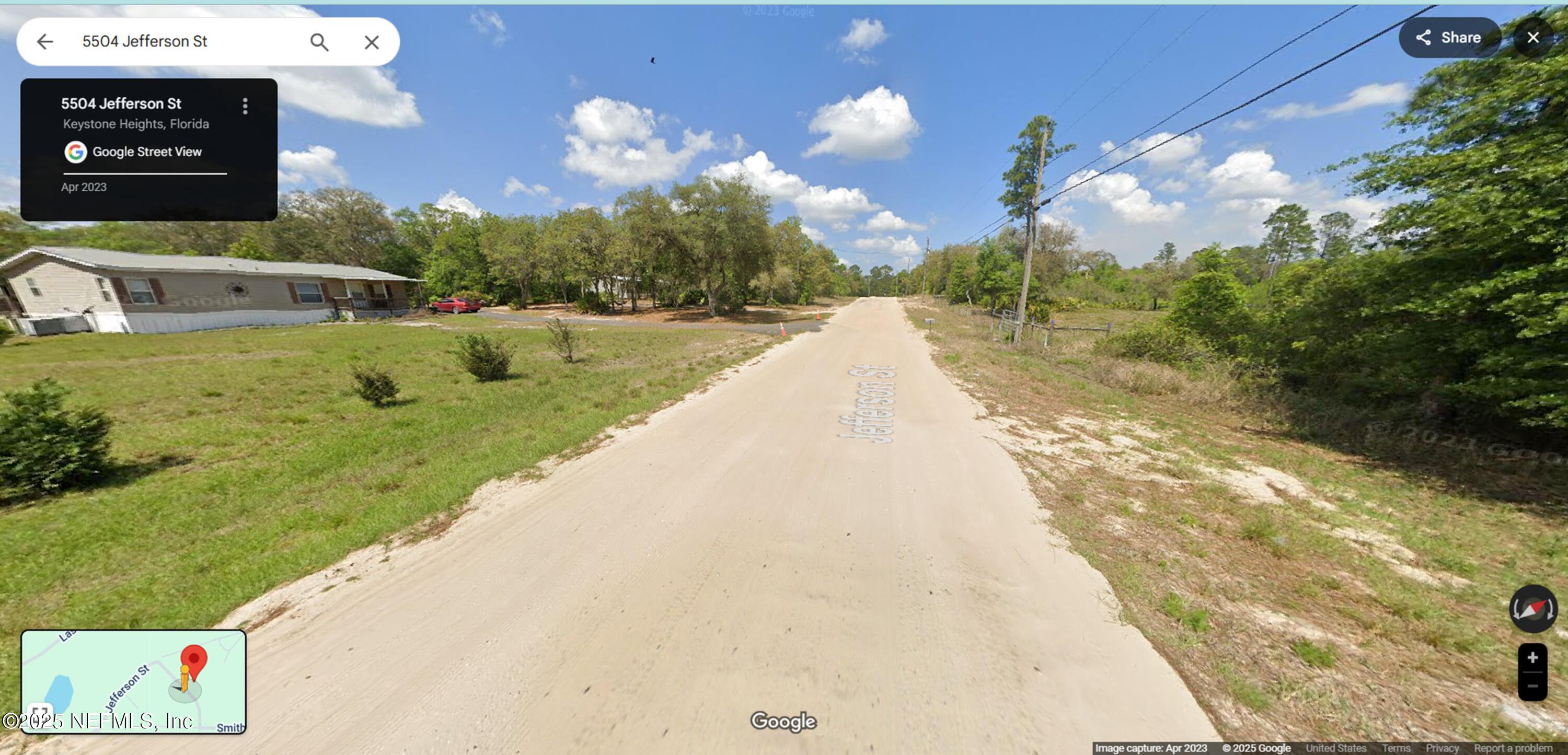 5504 Jefferson Street Keystone Heights, FL 32656 - Photo 1 of 8 a view of a street with a building in the background