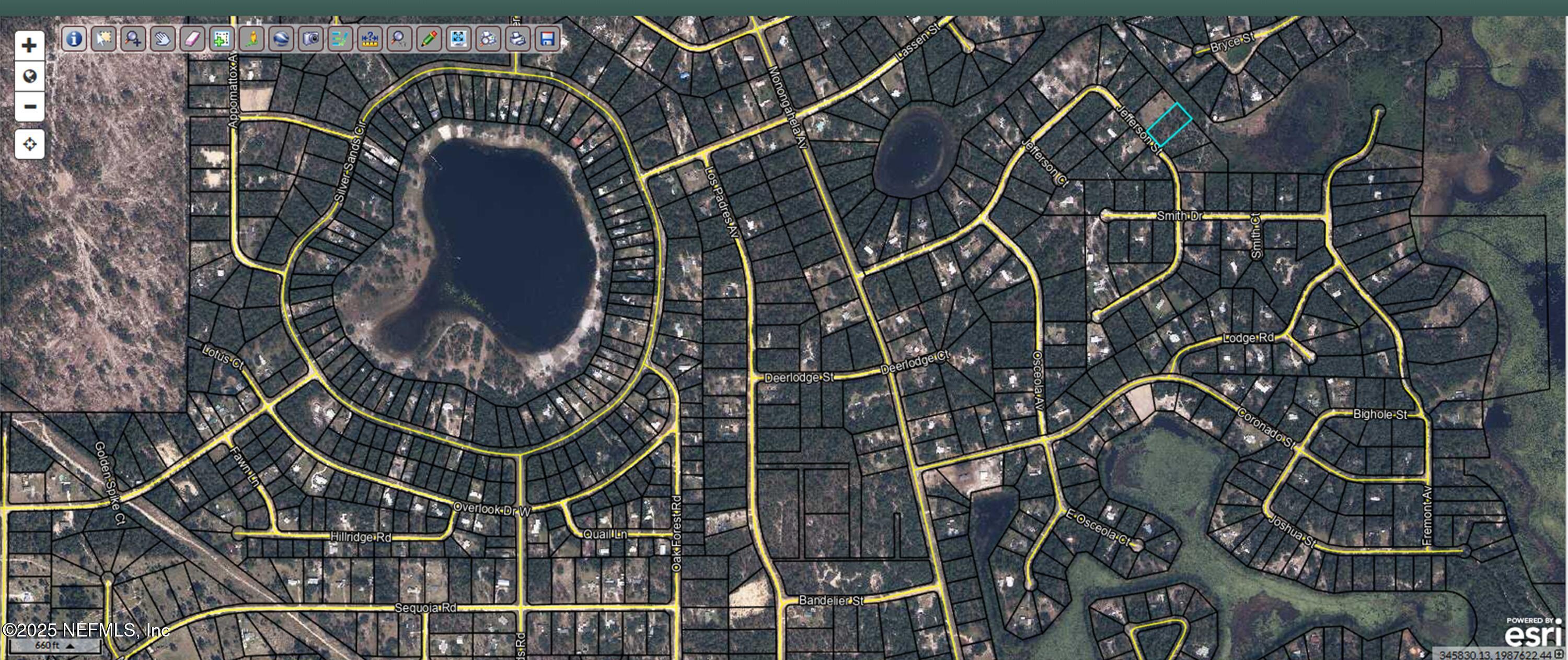 5504 Jefferson Street Keystone Heights, FL 32656 - Photo 6 of 8 an aerial view of a highlighted house