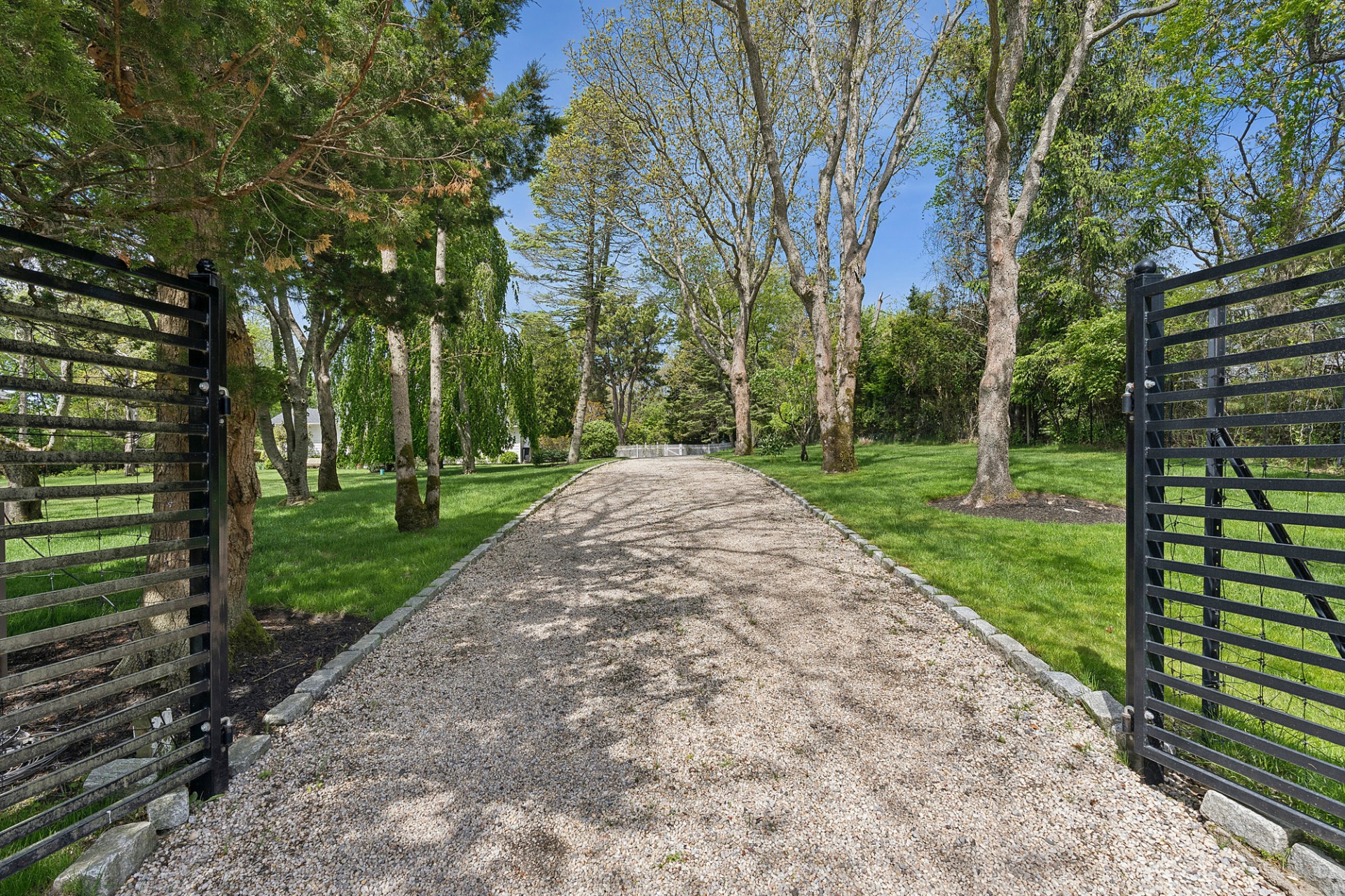 29 Petrel Road Southampton, NY 11968 - Photo 33 of 37 a view of a park with large trees