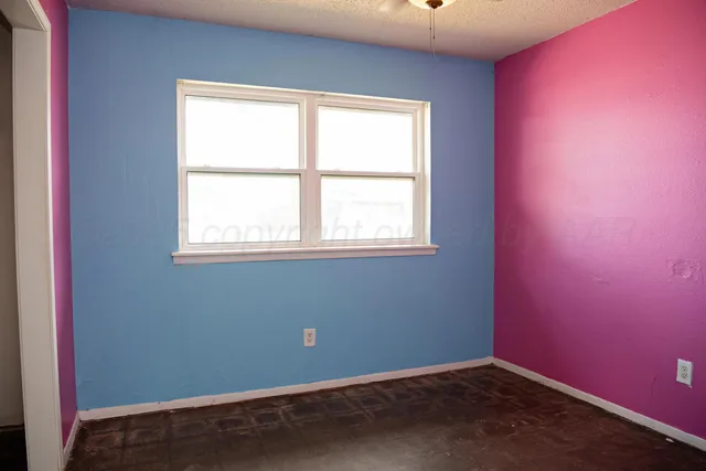 an empty room with a window