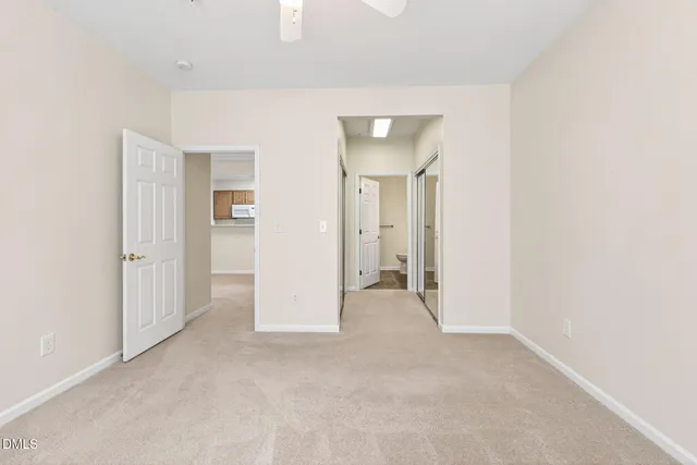 an empty room with a bathroom