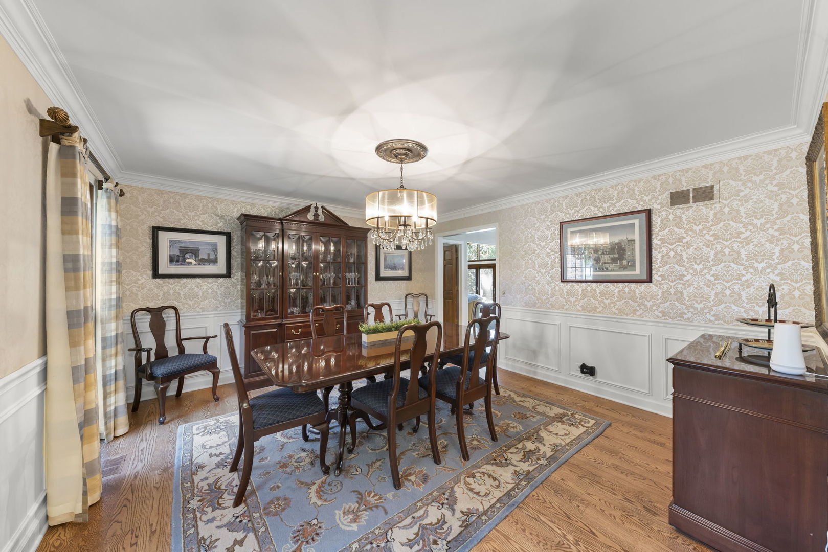 1921 Hampton Drive Wheaton, IL 60189 - Photo 12 of 54 a view of a dining room with furniture and wooden floor