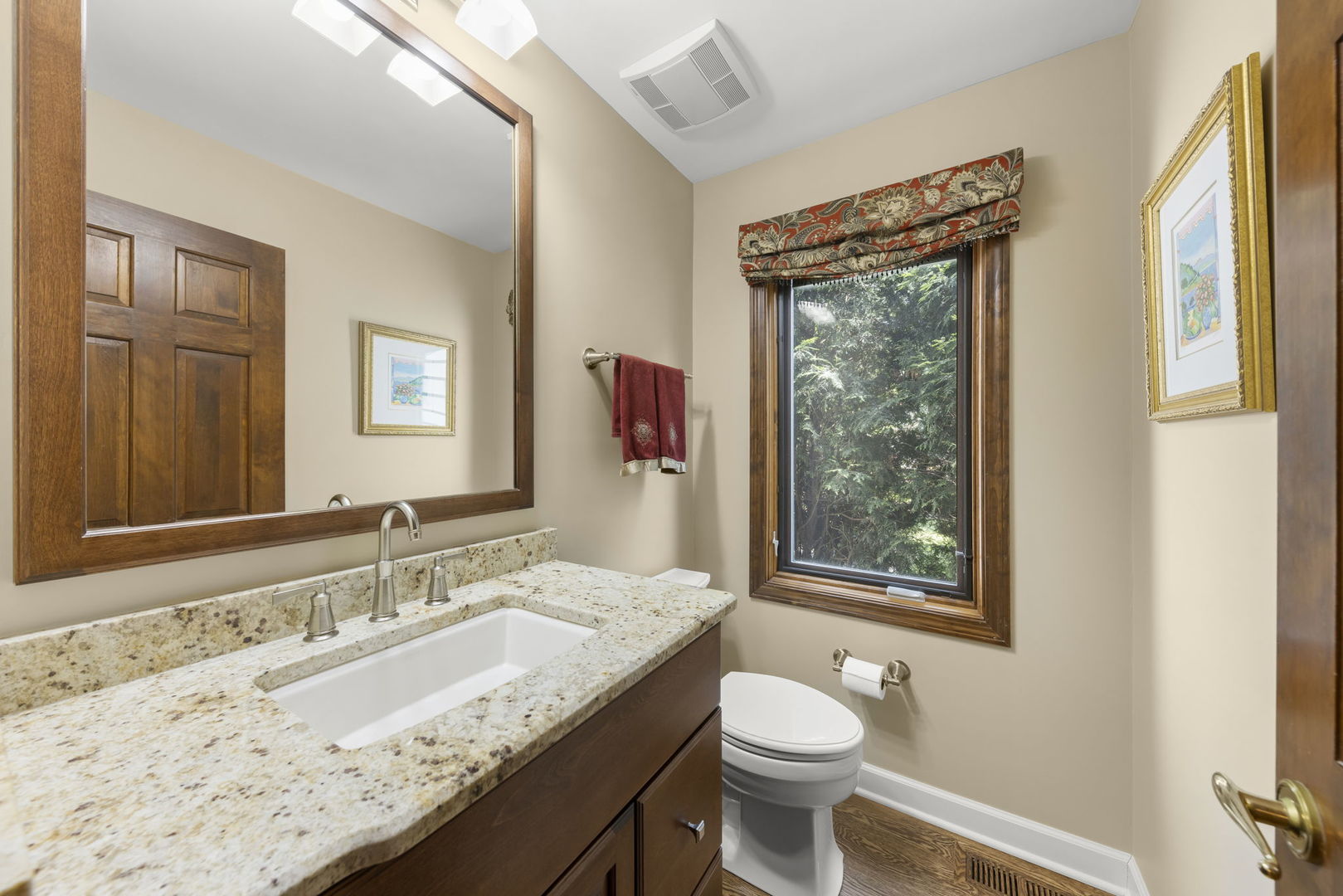 1921 Hampton Drive Wheaton, IL 60189 - Photo 17 of 54 a bathroom with a granite countertop sink toilet and large mirror