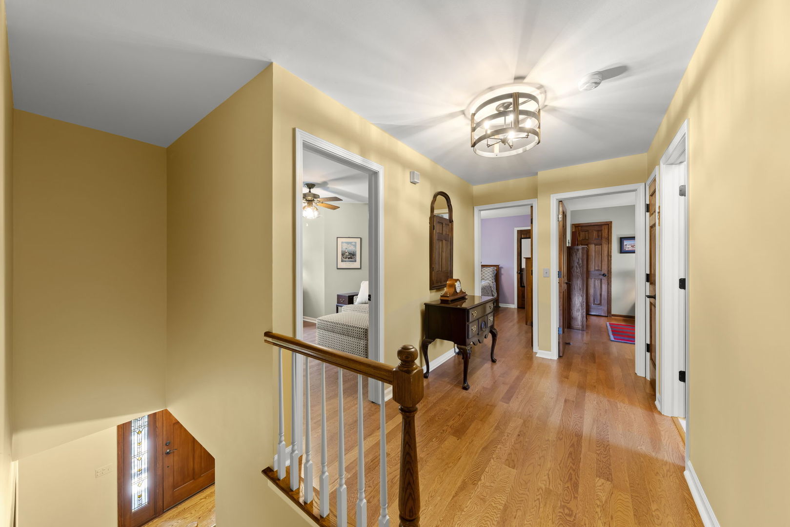 1921 Hampton Drive Wheaton, IL 60189 - Photo 19 of 54 a view of a hallway with wooden floor and stairs
