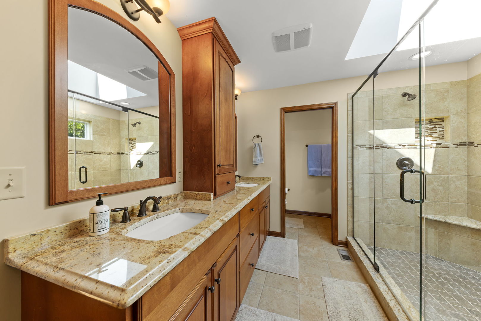 1921 Hampton Drive Wheaton, IL 60189 - Photo 22 of 54 a bathroom with a sink and a mirror