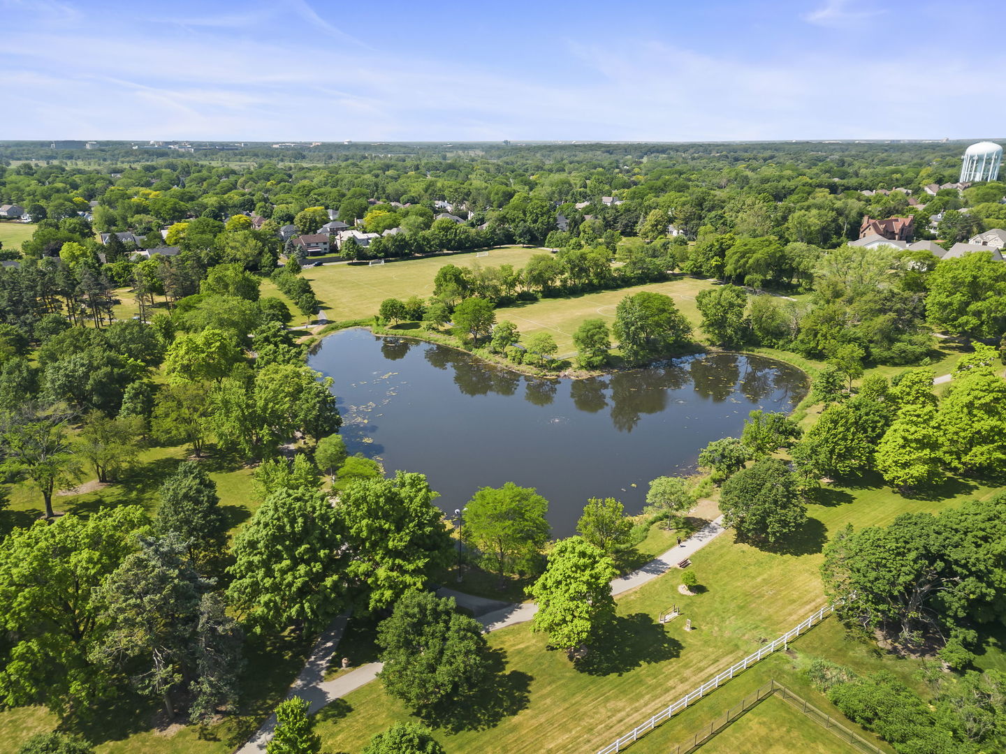 1921 Hampton Drive Wheaton, IL 60189 - Photo 41 of 54 a view of a lake with houses in the back