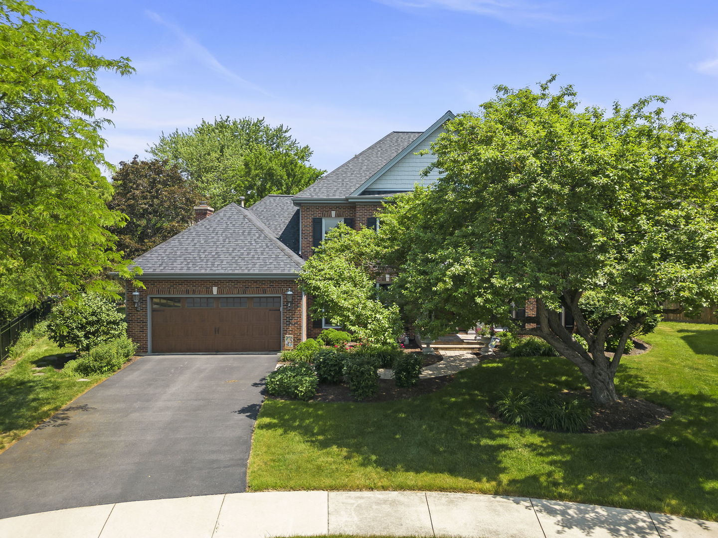 1921 Hampton Drive Wheaton, IL 60189 - Photo 42 of 54 a front view of a house with a yard
