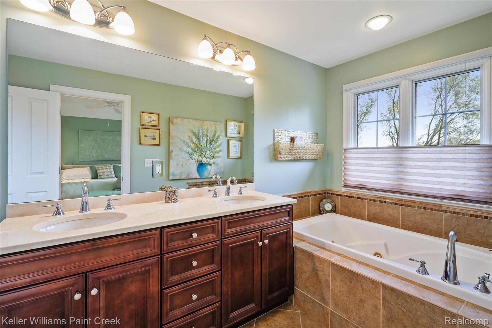 309 West 2nd Street Rochester, MI 48307 - Photo 9 of 19 Enjoy soaking stress away in the jacuzzi tub in the private master bath!