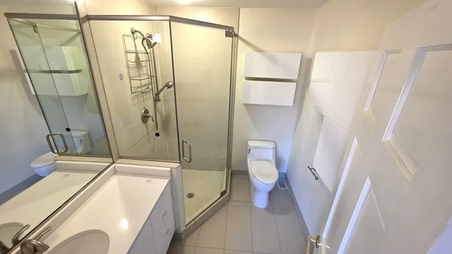 a bathroom with a sink and a shower