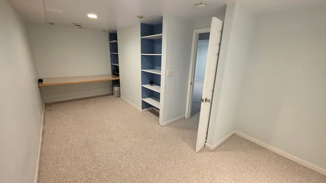 an empty room with a closet