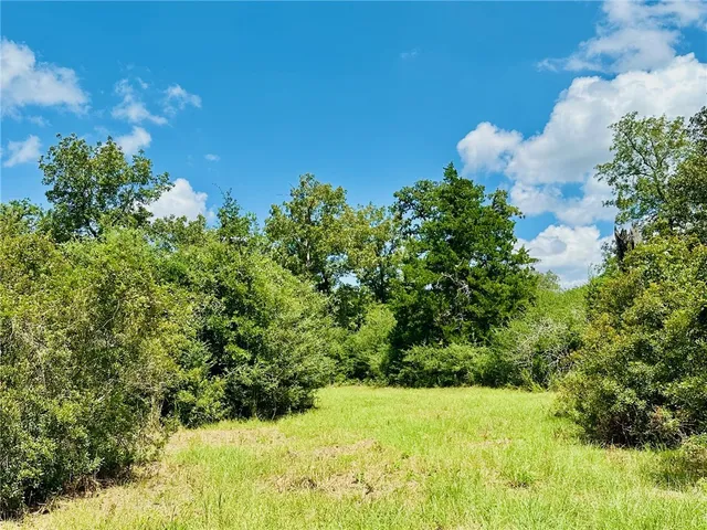 a view of a lake with a deck