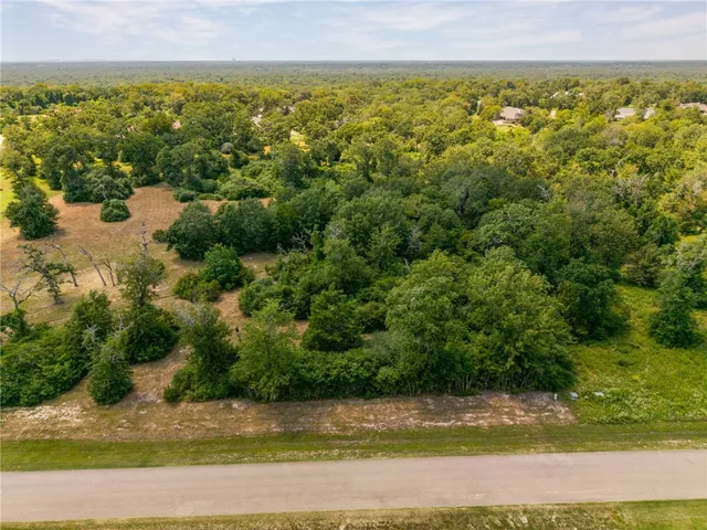 a view of a yard with an outdoor space