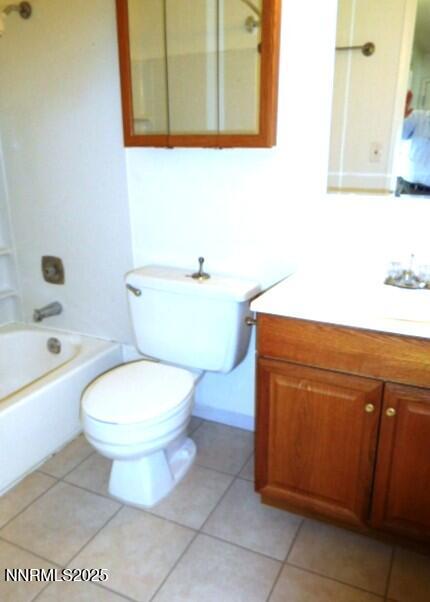 3952 Clear Acre Lane, Unit 275 Reno, NV 89512 - Photo 5 of 16 a bathroom with a toilet a sink and bathtub